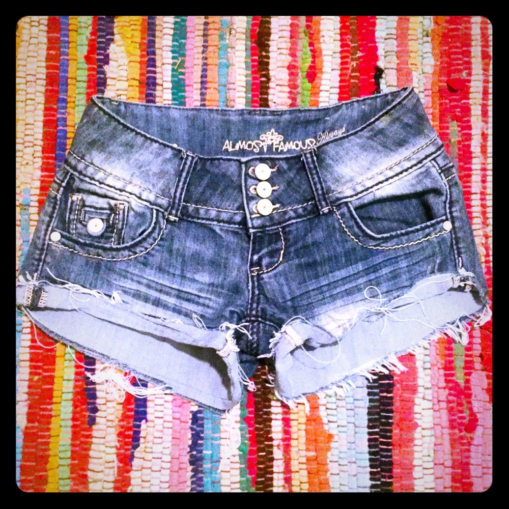 Distressed and frayed denim shorts